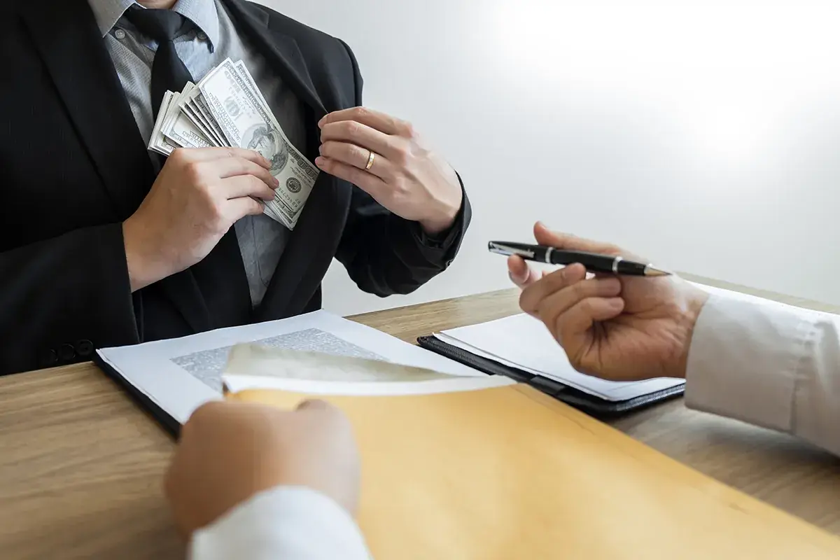 Counting cash while reviewing a bail agreement