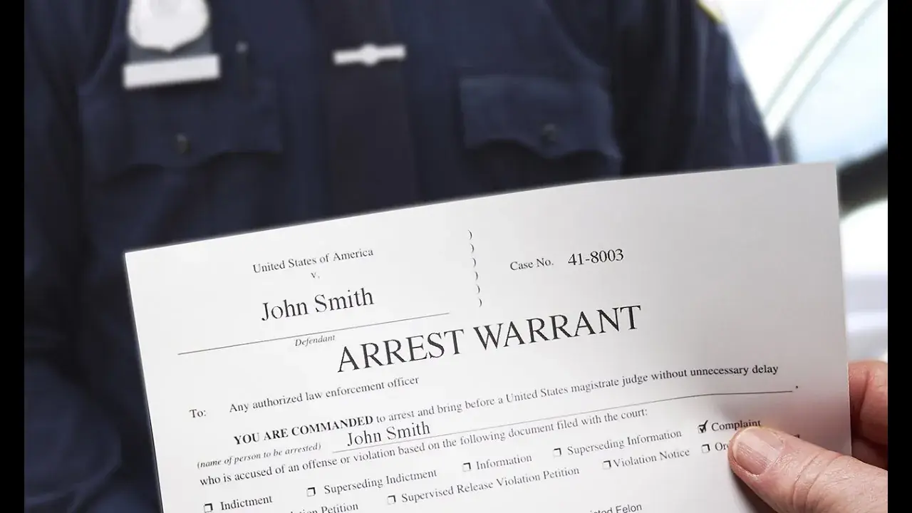 Close view of a signed arrest warrant